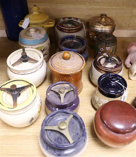 A Doulton Slaters Patent tobacco jar, a monk jar and twelve other tobacco jars, various (14)
